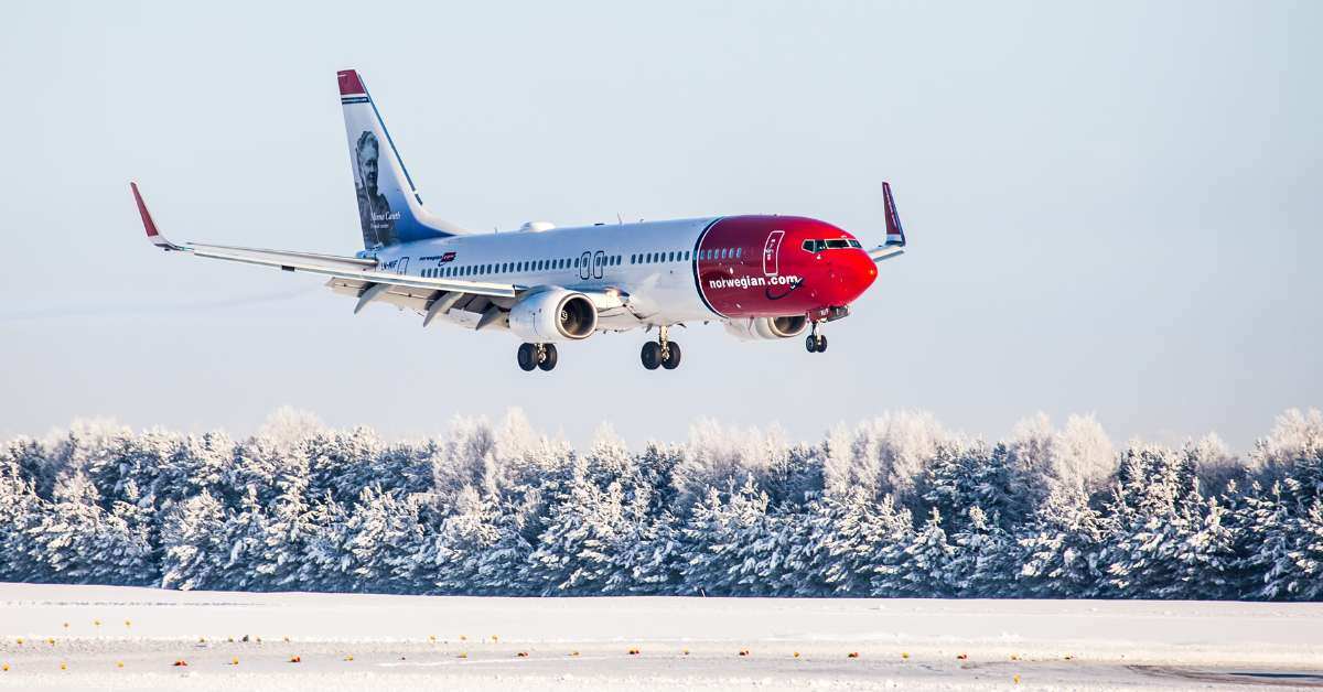 Med Okta IAM siger Norwegian farvel til manuel identitetshåndtering
